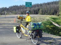 GDMBR: Terry Struck and the Bee at the Continental Divide (9584'/2921m), Togwotee Pass, and at Continental Divide Crossing #7 of the Great Divide Mountain Bike Route.